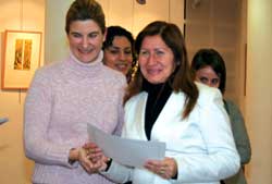 The Town Councillor of Social Services awarding a diploma